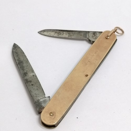 154 - 9ct gold mounted penknife with two blades 8cm long - total weight 21g- has a slight distortion to pa... 