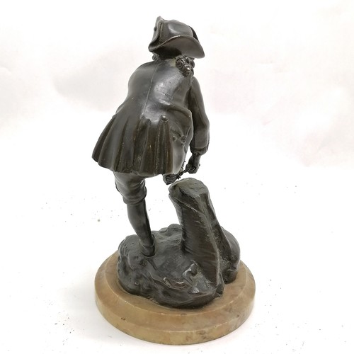 174 - Antique continental bronze figure of a young male tying on an ice skate on a marble base - 19cm high