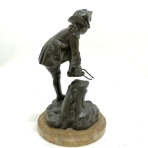 174 - Antique continental bronze figure of a young male tying on an ice skate on a marble base - 19cm high