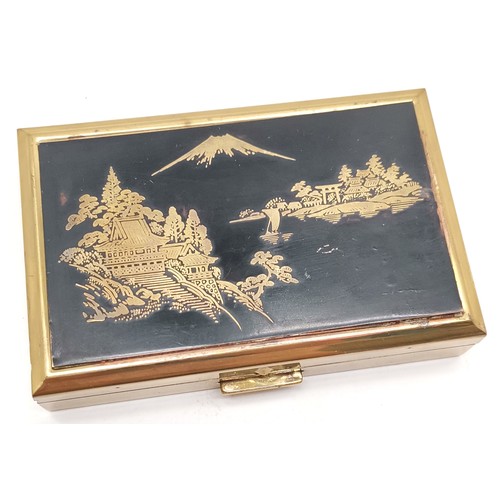 187 - Vintage musical compact by Clover with Mt Fuji design to lid - 8.5cm x 5.5cm and music plays at time... 