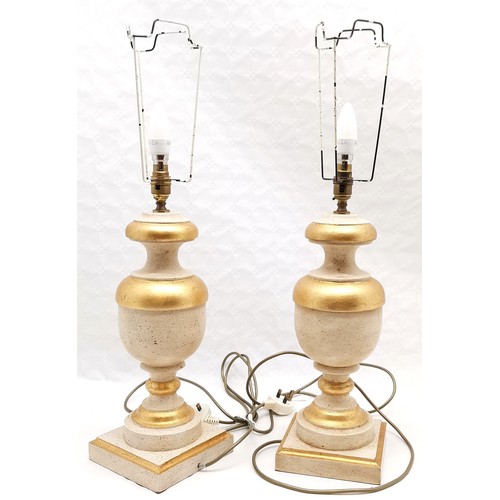 209 - Pair of classical style wooden lamps with gilt detail, 49 cm high, 17 cm wide.