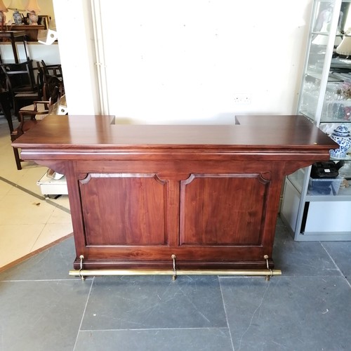 212 - Mahogany panel fronted bar, fitted with stainless steel basin, and a brass foot rail, 63 cm wide, 11... 