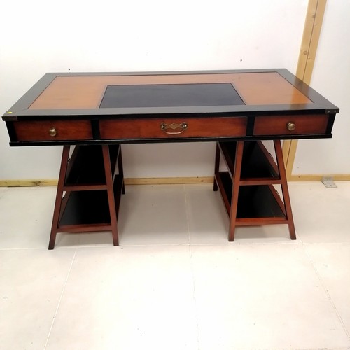 215 - Contemporary mahogany & ebonised desk By A M Authentic Models, 140 cm wide, 70 cm deep, 79 cm high.