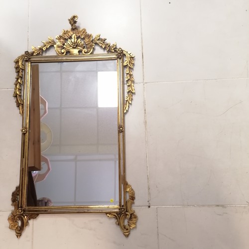 216 - Gilt wood mirror with swag detail to top, 63 cm wide, 110 cm high, Good condition.