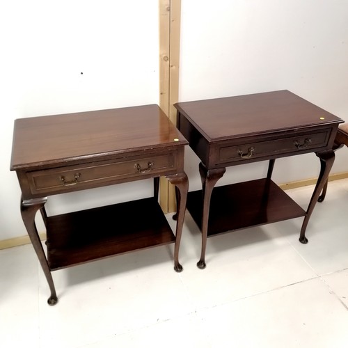 217 - Pair of mahogany bedside tables on carbriole legs, 62 cm wide, 41 deep, 68 cm high.,