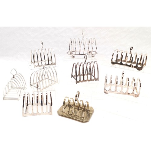 231 - Set of 4 Garrard's silver plated toast racks, 15 cm high, 11.5 cm wide, pair of Elkington plated toa... 