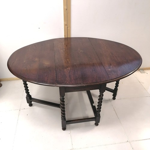 244 - 1930's oak drop flap gateleg table with barley twist supports, 106 cm wide, 147 cm length to include... 