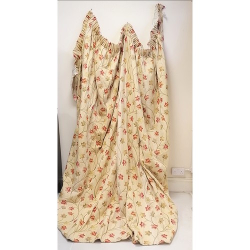 247 - Pair of cream floral lined curtains 240cm long x 300cm wide - some fading