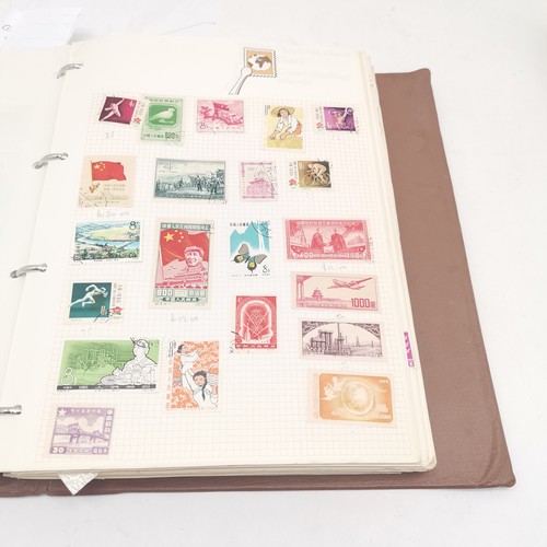 256 - SG International stamp album packed with stamps t/w Strand stamp album (virtually empty)