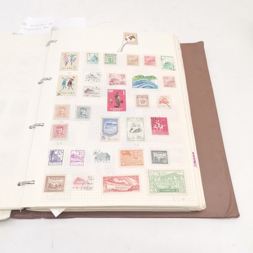 256 - SG International stamp album packed with stamps t/w Strand stamp album (virtually empty)