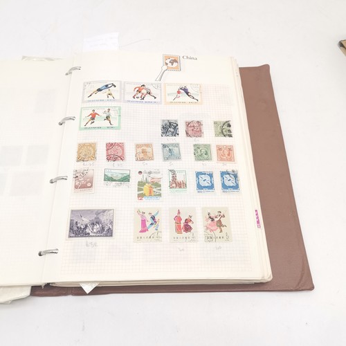 256 - SG International stamp album packed with stamps t/w Strand stamp album (virtually empty)