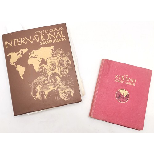 256 - SG International stamp album packed with stamps t/w Strand stamp album (virtually empty)