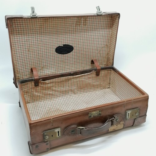 274 - Antique tan leather suitcase by George Perry (Dublin) with travel labels - 54cm x 34cm x 16cm