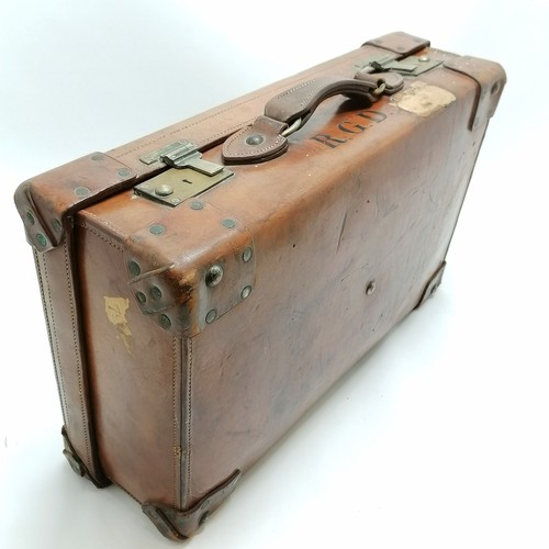 274 - Antique tan leather suitcase by George Perry (Dublin) with travel labels - 54cm x 34cm x 16cm