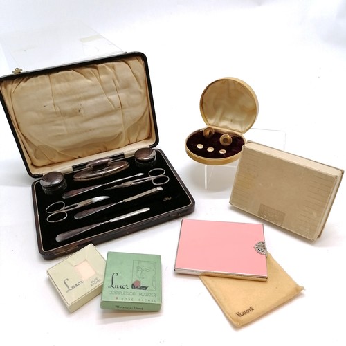 312 - Deakin & Francis silver mounted manicure set (missing 1 reticule), Volupte pink cigarette case in or... 