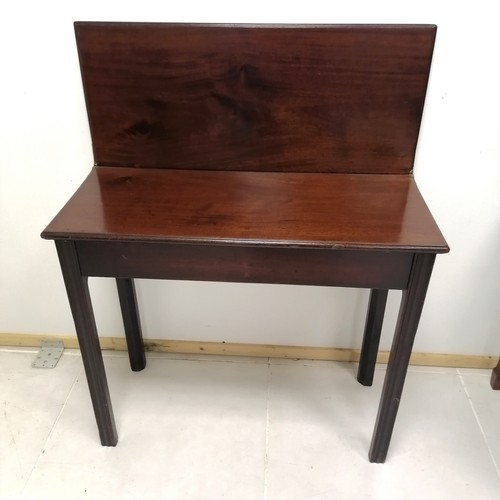 331 - Antique Mahogany Fold-over tea table on square block legs, 83 cm wide, 70 cm deep extended, 72 cm hi... 