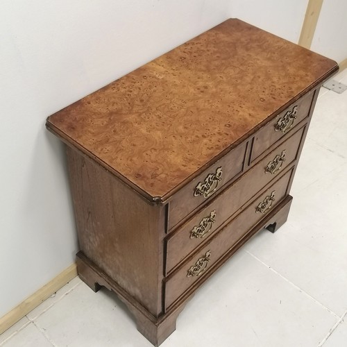 337 - William & Mary style burr oak chest of 2 short and 2 long drawers, with brass drop handles, on brack... 