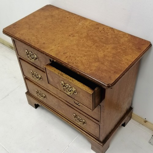 337 - William & Mary style burr oak chest of 2 short and 2 long drawers, with brass drop handles, on brack... 