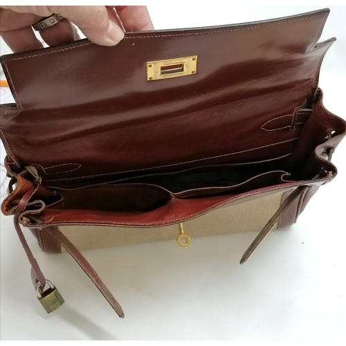 348 - Hermes late 1950's Kelly 28 handbag with original purchase receipt (for £43) and has lock (#002) and... 