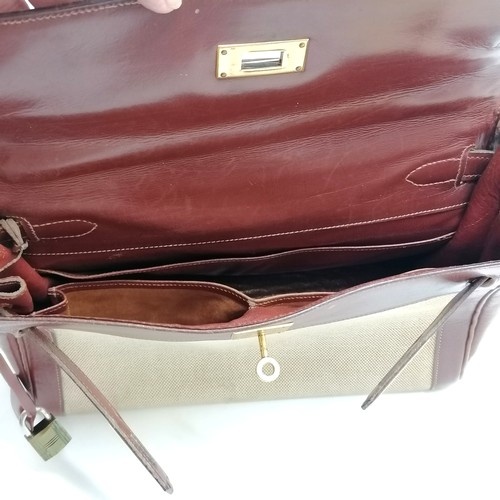 348 - Hermes late 1950's Kelly 28 handbag with original purchase receipt (for £43) and has lock (#002) and... 