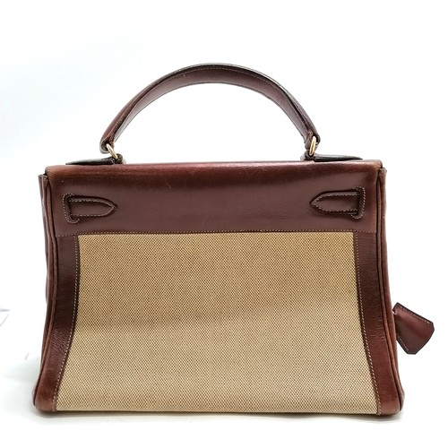 348 - Hermes late 1950's Kelly 28 handbag with original purchase receipt (for £43) and has lock (#002) and... 