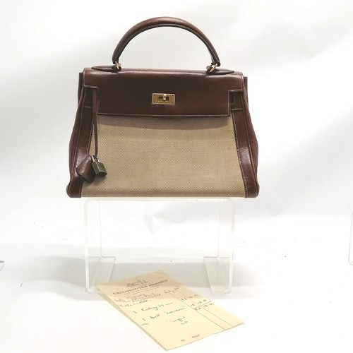 348 - Hermes late 1950's Kelly 28 handbag with original purchase receipt (for £43) and has lock (#002) and... 