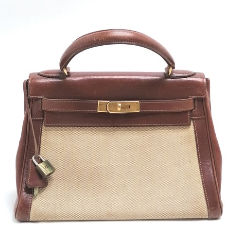 348 - Hermes late 1950's Kelly 28 handbag with original purchase receipt (for £43) and has lock (#002) and... 