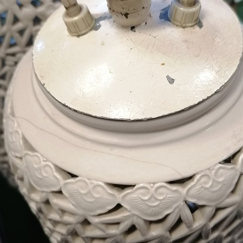 351 - 2 Chinese Blanc de Chinse ceramic lamp bases tallest 45cm high and has a crack near the top rim