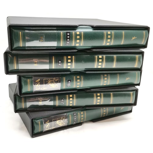 354 - Extensive USA stamp collection in 5 green folders in slipcases with mostly mint stamps / blocks / sh... 