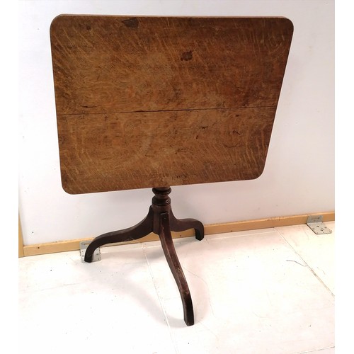 370 - Antique tilt top oak occasional table on turned column and tripod base, 67 cm wide, 52 cm deep, 65 c... 