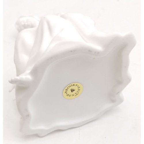 387 - Royal Worcester white porcelain dolphin salt, 12 cm high, 12 cm wide, 12 cm deep, slight chip to rim... 