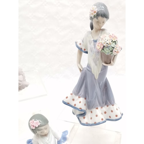 398 - Lladro Pair of Spanish Flamenco dancers 'Olé' 28cm high, Young girl in Flamenco dress holding pot of... 