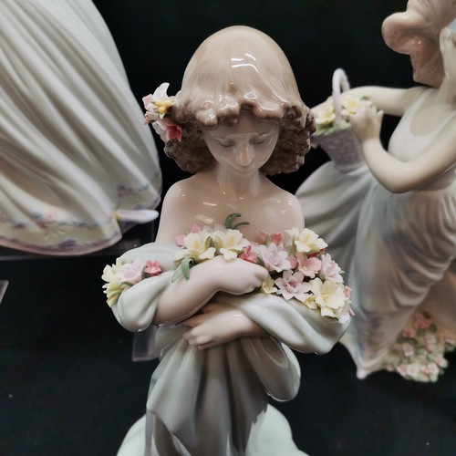 401 - Lladro Cinderella figure, 26.5 cm high, Girl with basket of flowers, 28.5 cm high, t/w girl with bou... 