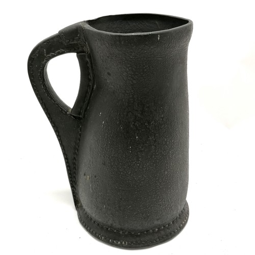 440 - Antique leather flagon / blackjack - 24cm high