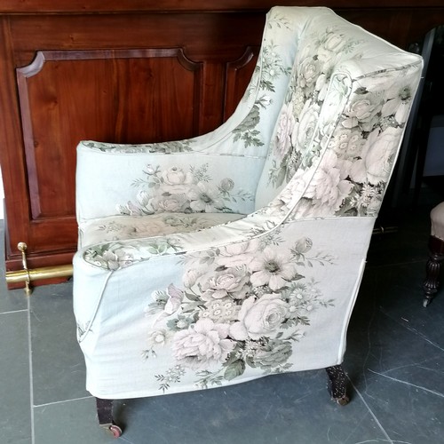 480 - Antique scroll arm easy chair, on square tapered legs, with green floral loose cover, 73 cm wide, 72... 