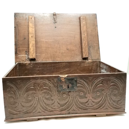 487 - Antique oak bible box with carved front panel 70cm x 44cm x28cm high- has a broken hasp otherwise in... 