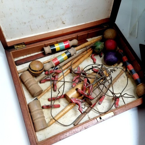 517 - Antique mahogany games compendium box (44cm x 25cm x 19cm) containing dominoes, markers, counters et... 