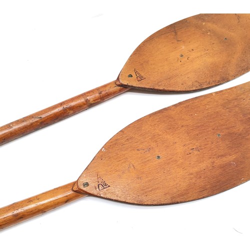 528 - Vintage 2 part paddle by Prout,1 x 132 cm & 1 x 120 cm.