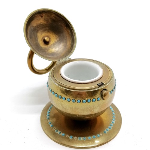 542 - Antique brass inkwell with hinged lid & blue bead detail - 8cm diameter base and has losses to beads