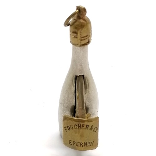 551 - Antique champagne bottle - Foucher & Co Epernay - design cigar cutter - 5.5cm long