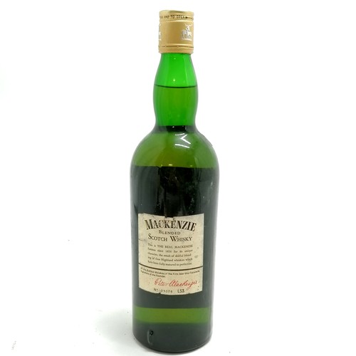 564 - Vintage Mackenzie unopened bottle of whisky - label slight a/f