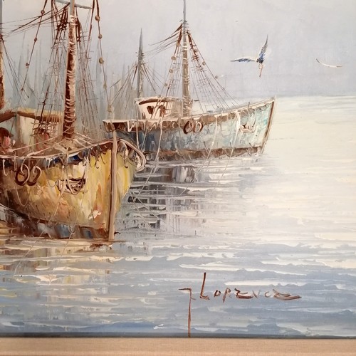 573 - Large framed & signed oil painting on canvas of fishing boats at a quay - 72.5cm x 133cm