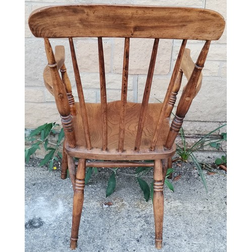 583 - Antique Windsor elm stick back carver chair, 52 cm wide, 42 cm deep, slight crack to seat, but overa... 