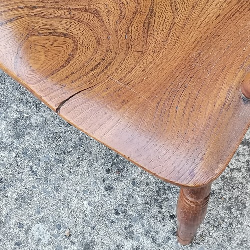 583 - Antique Windsor elm stick back carver chair, 52 cm wide, 42 cm deep, slight crack to seat, but overa... 