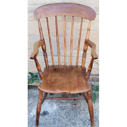 583 - Antique Windsor elm stick back carver chair, 52 cm wide, 42 cm deep, slight crack to seat, but overa... 