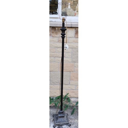 587 - A Contemporary classical inspired floor lamp, 24 cm diameter base, 164 cm high to include shade.