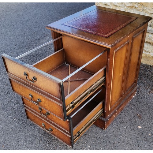 590 - Reproduction oak filing cabinet with Burgundy leather inset top, used condition with some loose bead... 