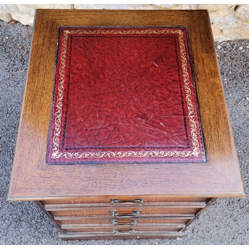 590 - Reproduction oak filing cabinet with Burgundy leather inset top, used condition with some loose bead... 