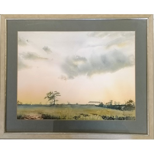 119 - Dermot Power 1988 watercolour of a countryside landscape with rolling clouds - frame 52.5cm x 64cm