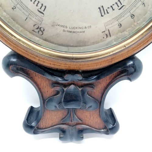 133 - James Lucking & Co (Birmingham) Art Nouveau oak barometer / thermometer with ebonised deep carved de... 